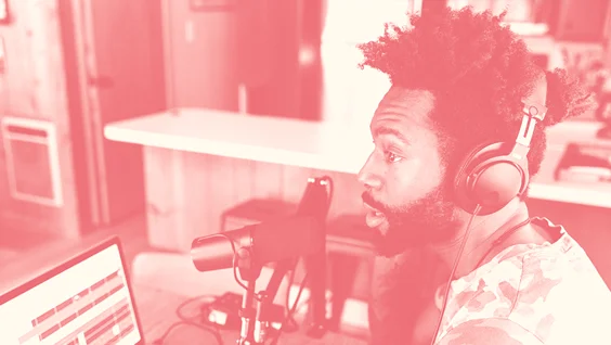 Man speaks into a microphone