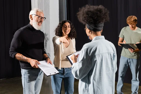 Group of actors with scripts
